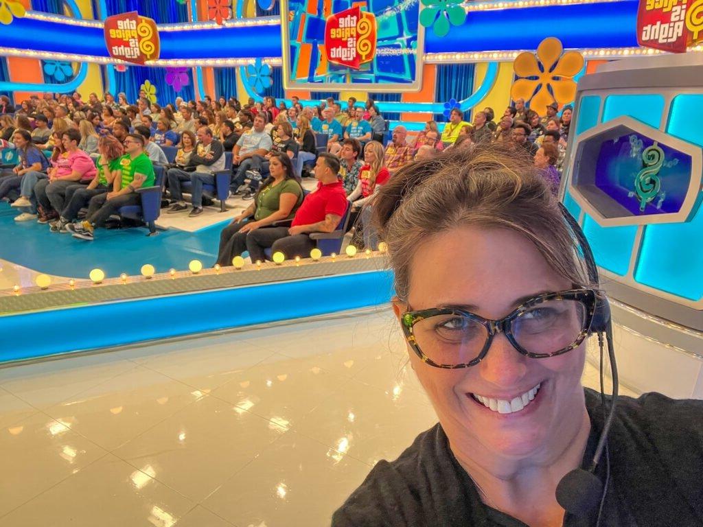 Hayley Blain-Weinstein poses in front of an in-studio crowd