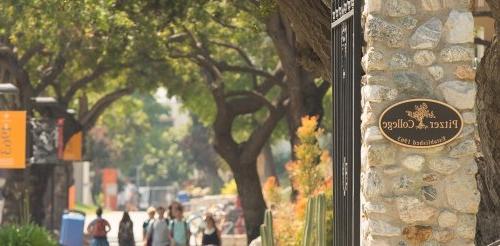 Gate entry and plaque for Pitzer College campus